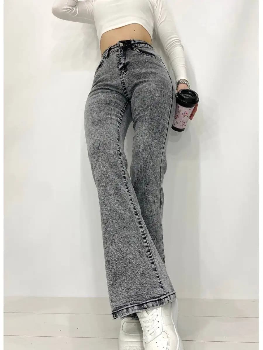 Джинсы клеш от колена с высокой посадкой