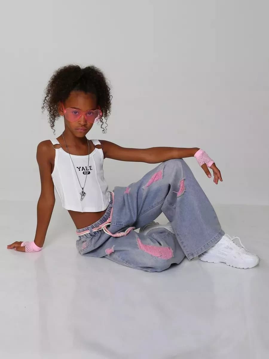 Брюки джинсы рваные