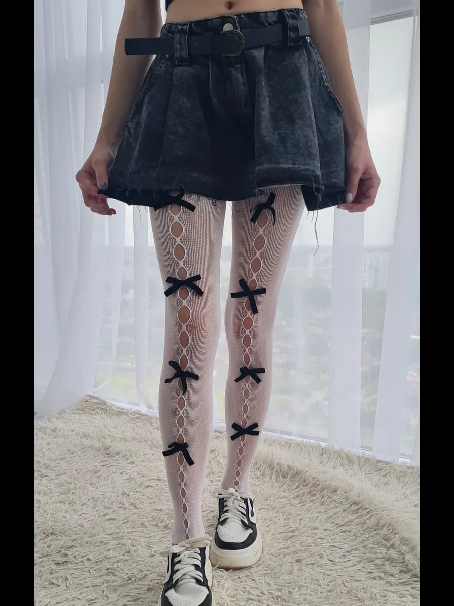 Колготки в сетку с бантиками