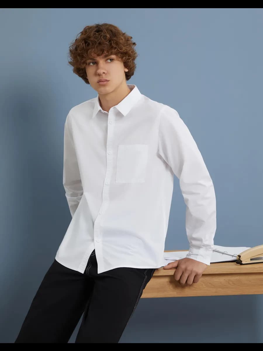 Белая школьная рубашка с длинным рукавом