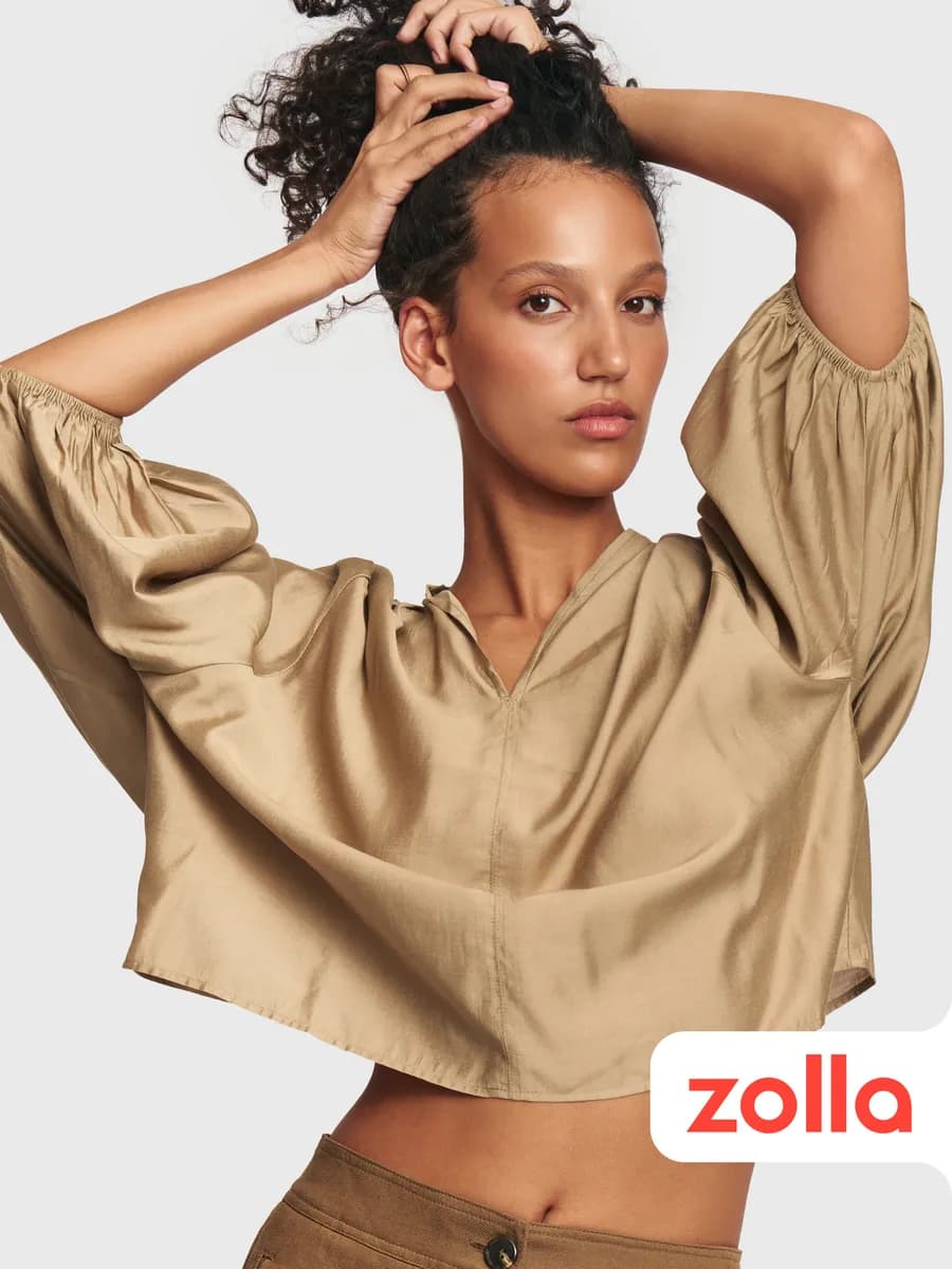 Женская однотонная блузка с вырезом