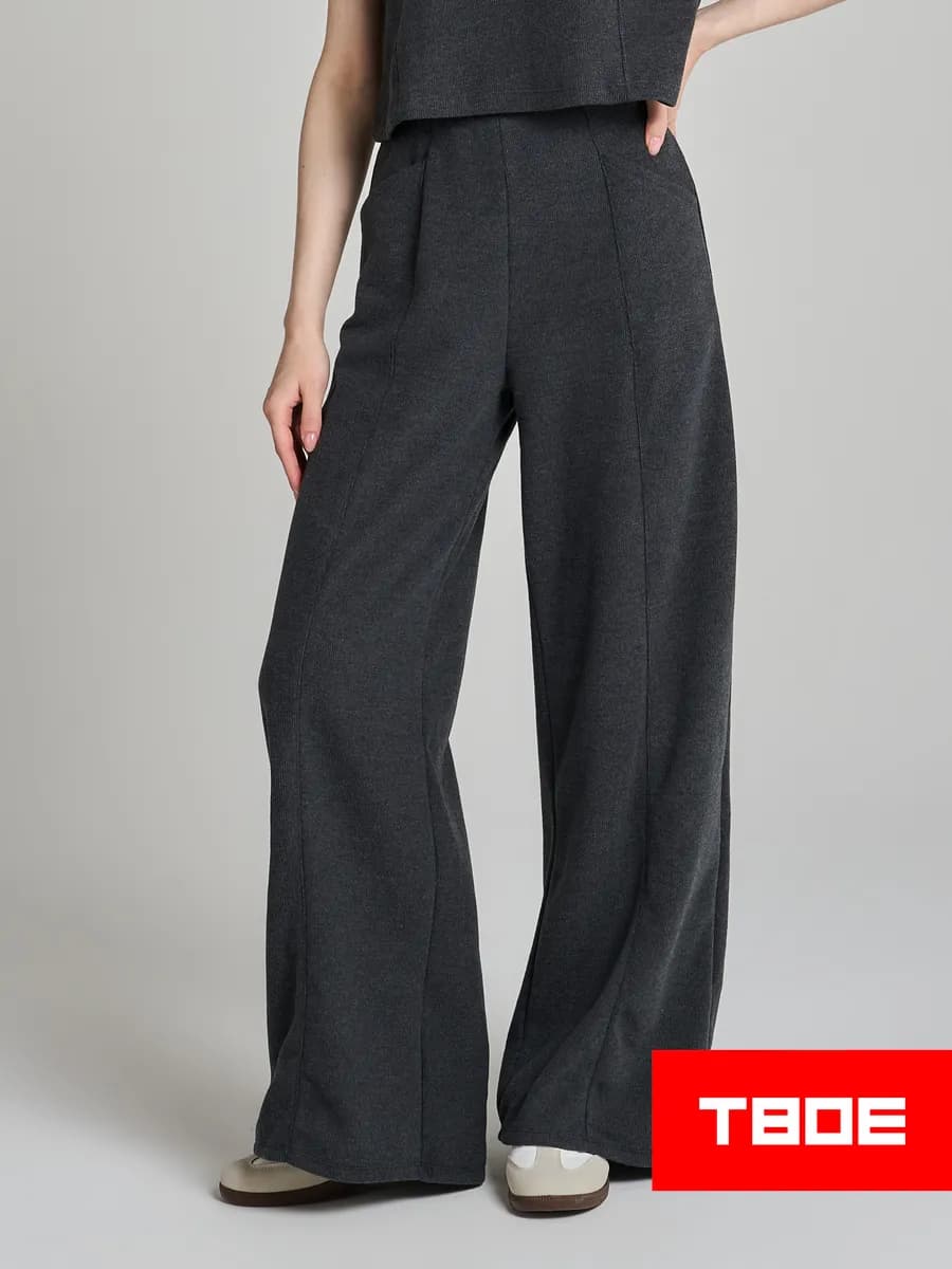 Широкие брюки в рубчик со стрелками