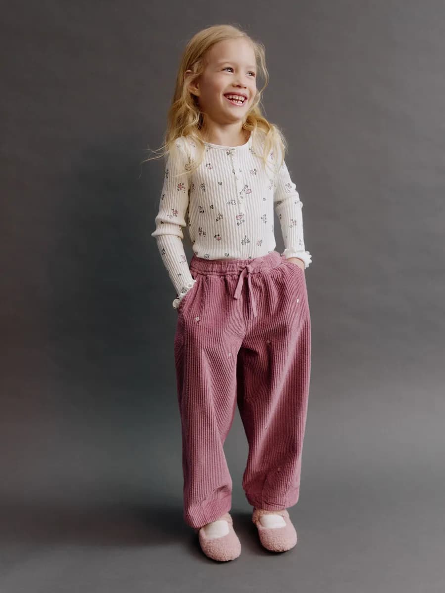 Вельветовые брюки свободные на резинке розовые